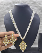 Luxurious Glow Kundan Pendant necklace earring set