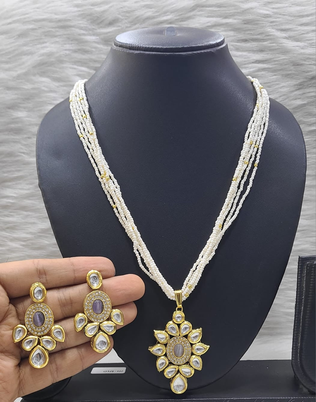 Opulent Highlight Kundan Pendant necklace earring set